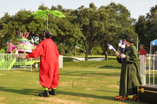 Zerp Balancing an umbrella while Badger Juggles