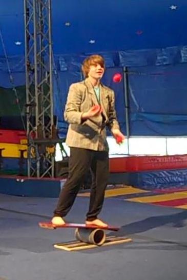 Juggling on Rolla Bolla screencap cropped portrait