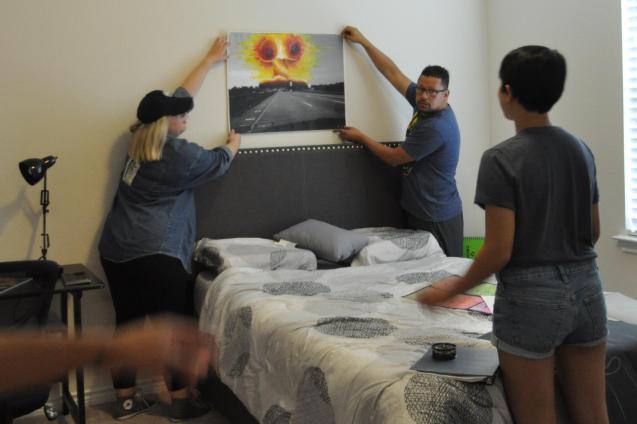 Crew setting up Jacob's bedroom Beyond the Bridge